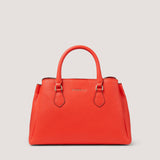 The orange Paloma mini handbag features a detachable and adjustable shoulder strap and three practical compartments.