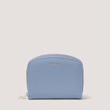 The Benny small purse is made from premium faux-leather in light blue.
