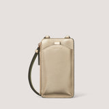 The Aurora phone crossbody bag in gold is sophisticated, compact and easy to use.