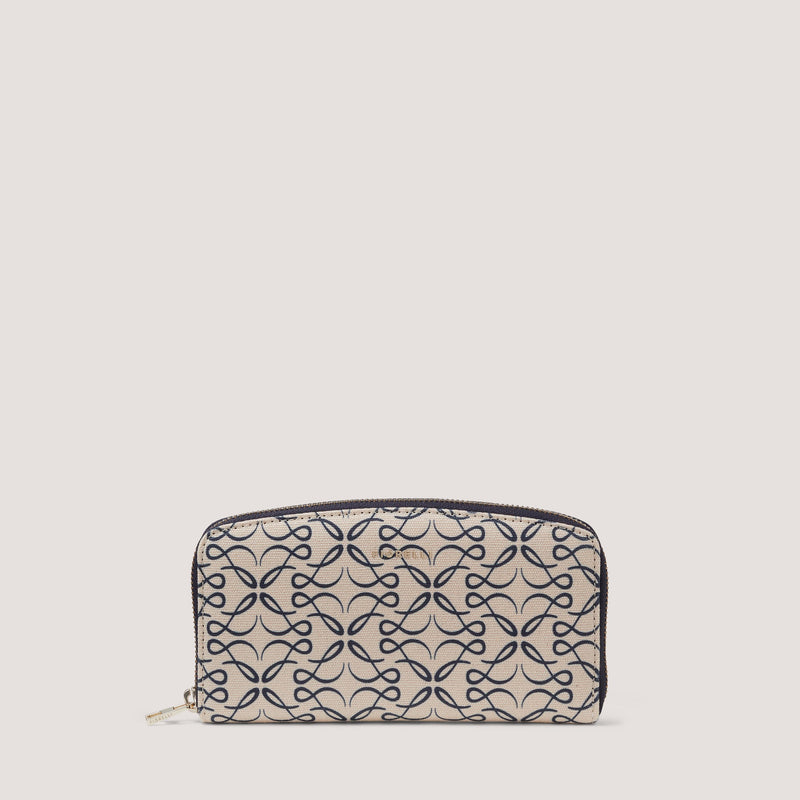 The Benny purse is made from durable canvas and elevated with a Fiorelli monogram print.