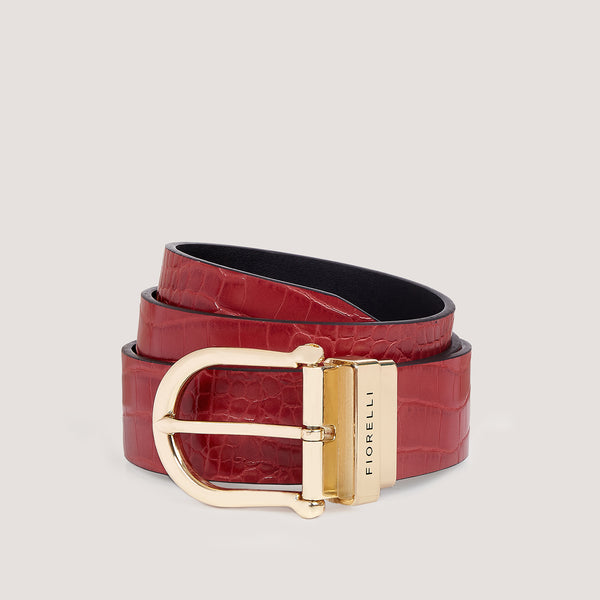 A stylish, reversible red belt with a sleek gold buckle.