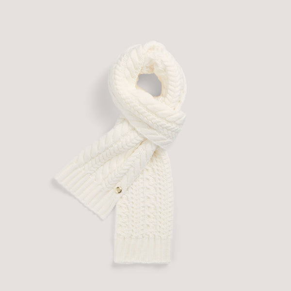 Cream cable knit rectangular scarf.